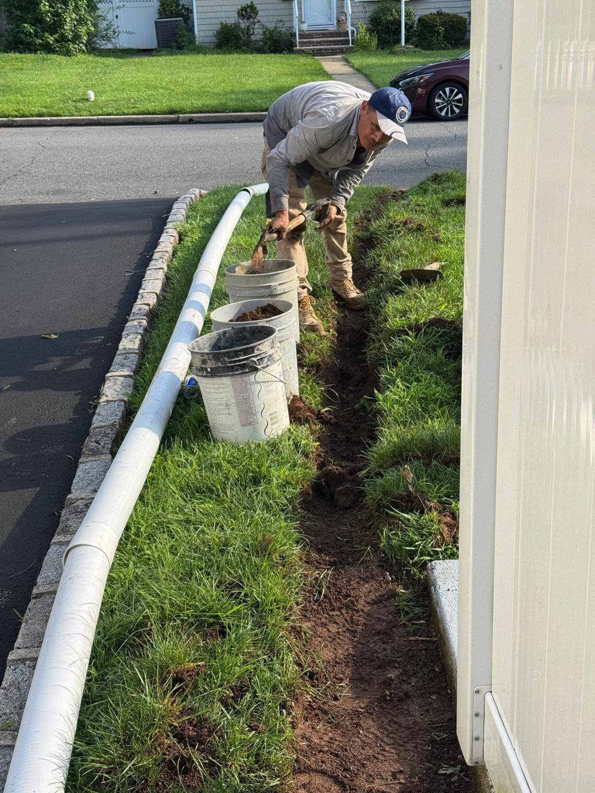 Downspout drainage work by Green Force Property Services